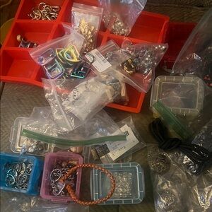 Source Unknown Assorted Craft Supplies in Red, Blue, and Clear